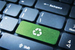 Image of keyboard with recycling logo.